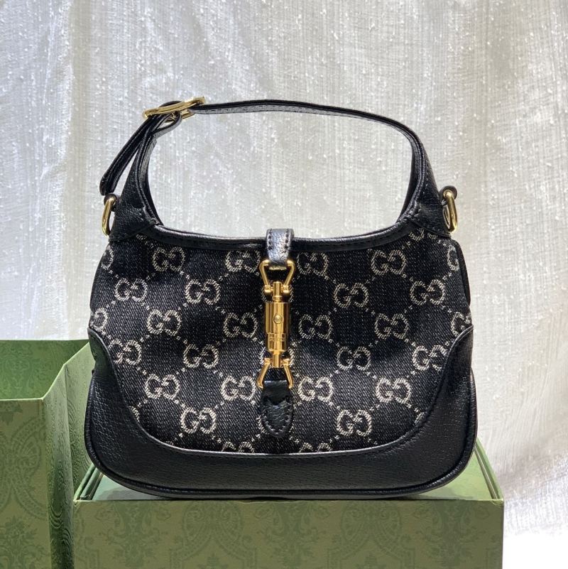 G*u*i top handle bags